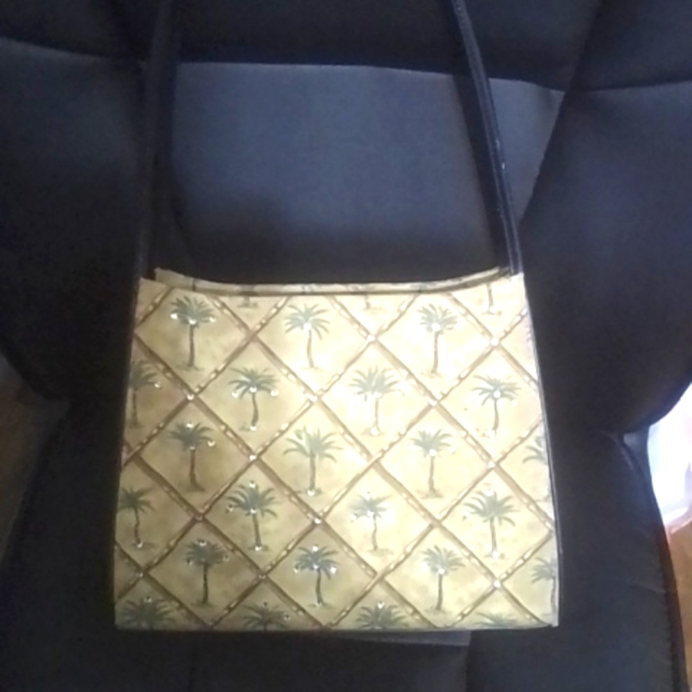 Belks. Palm Tree purse with rhinestone embellish on the front of the palm trees.
